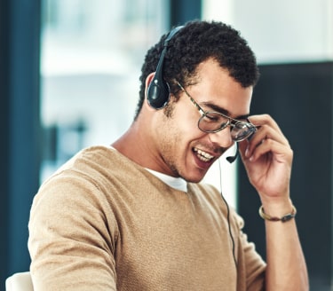 male receptionist taking calls