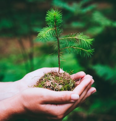 Smiling AnswerConnect employee on his mobile phone